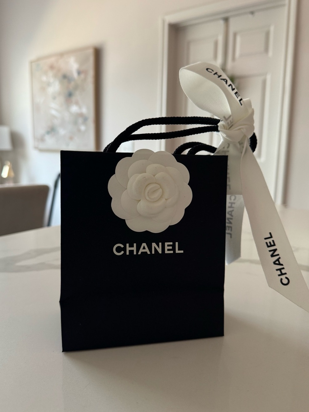 CHANEL Black Mini Gift Bag with White Camellia and Ribbon